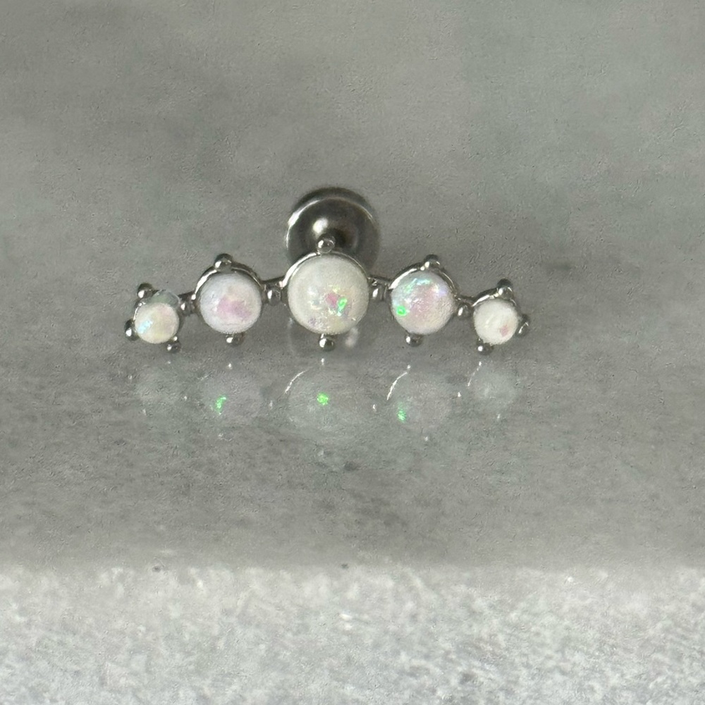 Silver Opal Moon Beam Gem Arch Cartilage Earring 

Brand New

Stainless Steel